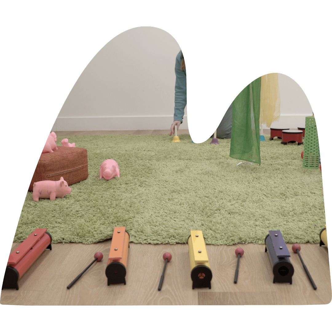 Person setting up musical instruments